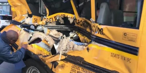 A damaged school bus is seen at the scene of a pickup truck attack in Manhattan, New York